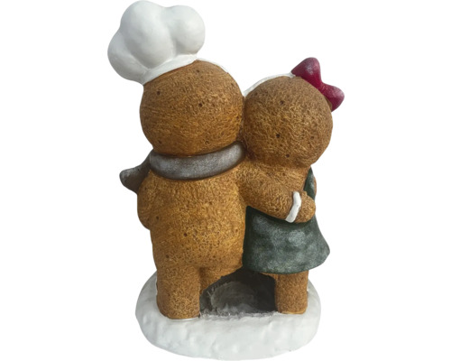Dekorative Lebkuchenfiguren umarmen sich, ein Bäcker mit Kochmütze und ein Mädchen mit Schleife