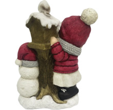 Dekoratives Weihnachtsstück mit Schneemann und Kind an einer Laterne