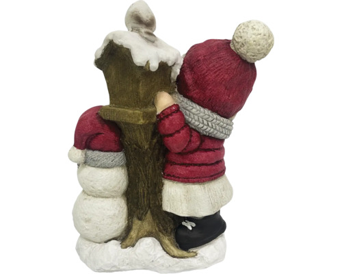 Dekoratives Weihnachtsstück mit Schneemann und Kind an einer Laterne