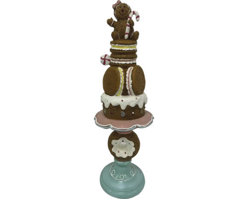Dekorative Süßigkeitenfigur mit Lebkuchenmann, Makronen und Donut