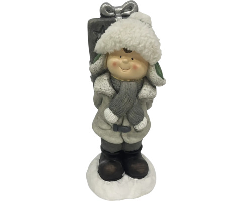 Dekofigur eines Jungen mit Geschenk für die Weihnachtsdekoration