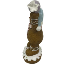 Lebkuchenmannfigur mit Mütze als Weihnachtsdekoration