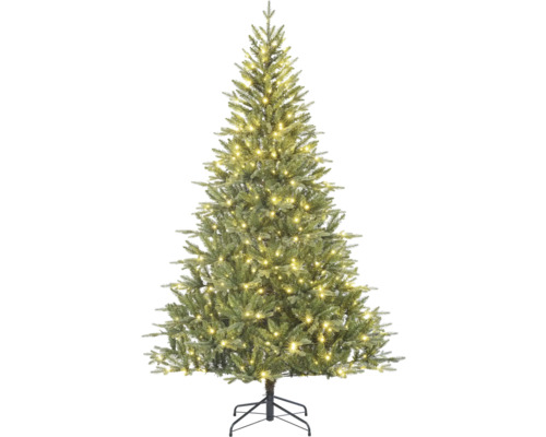 Künstlicher Tannenbaum mit Beleuchtung auf einem Ständer