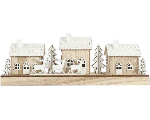 Dekorative Holzlandschaft mit Häusern, Bäumen und Rentieren für die Weihnachtszeit