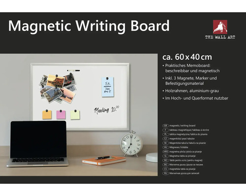 Magnetische Schreibtafel circa 60 x 40 Zentimeter mit Holzrahmen und Zubehör auf einem Schreibtisch