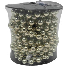 Dekokette mit Perlen im Kunststoffbehälter