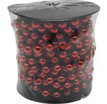 Rolle mit glänzender, roter Perlenkette zur Dekoration