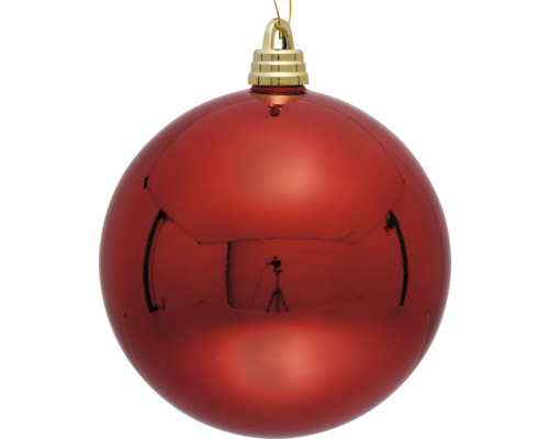 Rote Weihnachtskugel mit goldfarbener Aufhängung