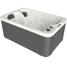 Whirlpool mit grauer Verkleidung und integrierten Düsen