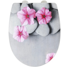 Toilettendeckel mit Stein- und Blütenmuster