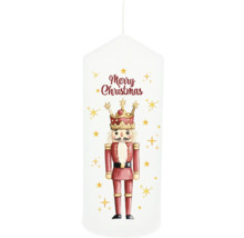 Kerze mit Nussknacker und der Aufschrift Frohe Weihnachten