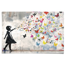 Dekoratives Wandbild mit Mädchensilhouette und bunten Schmetterlingen
