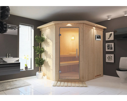 Moderne Badezimmerszene mit Ecksauna, Waschbecken und Toilette.