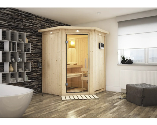Elementsauna Karibu Larina inkl. 9 kW Ofen u.ext.Steuerung mit Dachkranz und Ganzglastüre aus Klarglas Ecksauna aus Holz mit Glastür in einem hellen Badezimmer