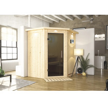 Holzsauna mit Glastür in einem hellen Raum