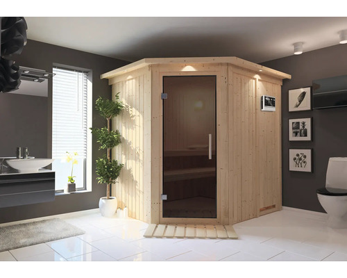 Badezimmer mit Ecksauna, Waschbecken und Toilette