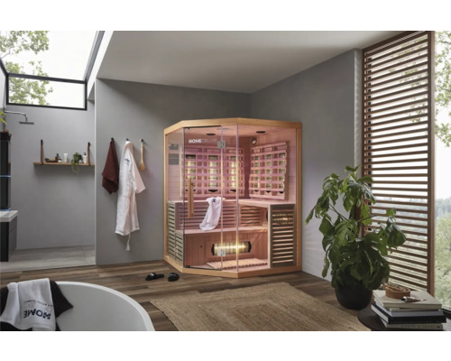 Badezimmer mit Sauna, Badewanne und Zimmerpflanze für eine entspannende Atmosphäre