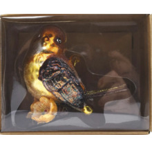 Dekorativer Glasvogel im Karton