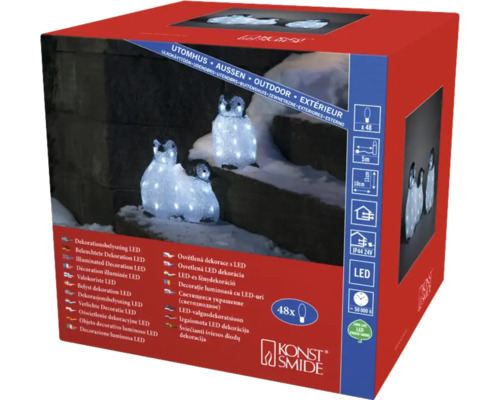 Verpackung einer LED-Dekoration mit Pinguinmotiven für den Außenbereich