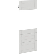 Zwei weiße Möbelklappen mit Lamellenstruktur