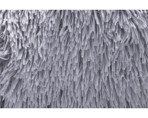 Nahaufnahme einer grauen, zotteligen Textur