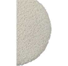 Detailaufnahme eines runden, texturierten Sitzkissens