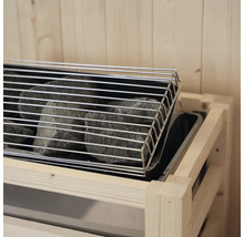 Saunaofen mit Steinen und Schutzgitter