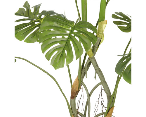Künstliche Monstera Pflanze mit Blättern und Stamm