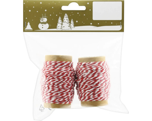 Zwei Rollen rot-weißes Dekoband in einer Verpackung