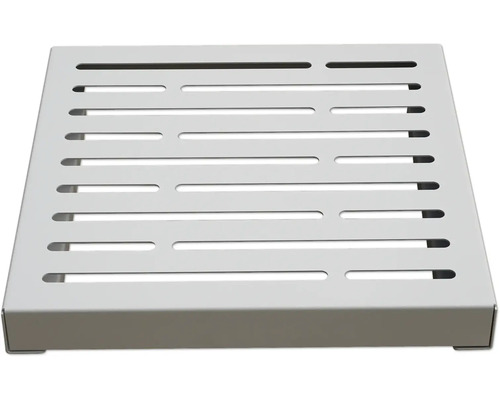 Quadratische Duschablage mit Schlitzen.