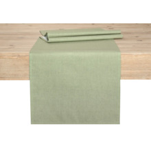 Tischläufer aus Stoff auf einem Holztisch