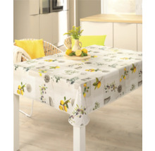 Quadratische Tischdecke mit Zitronen- und Olivenmuster auf einem Esstisch.