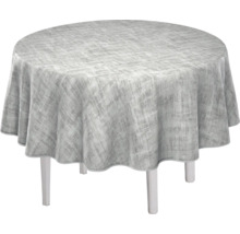 Runder Tisch mit gemusterter Tischdecke