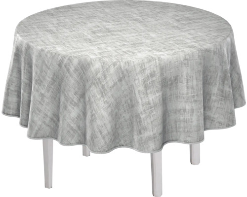 Runder Tisch mit gemusterter Tischdecke