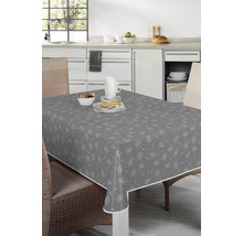 Graue Tischdecke mit Löwenzahnmuster auf einem Esstisch