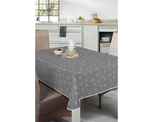 Graue Tischdecke mit Löwenzahnmuster auf einem Esstisch