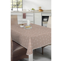 Tisch mit beschichteter Tischdecke mit Löwenzahnmuster in einer Küche