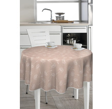 Runder Tisch mit Tischdecke mit Pflanzenmuster in einer Küche