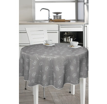 Runder Tisch mit grauer Tischdecke und Pusteblumenmuster in einer Küche.