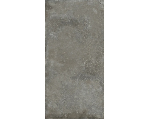 Graue Bodenfliese mit Betonoptik.