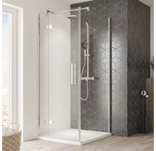 Duschkabine mit Brausegarnitur vor grau gemusterter Wand