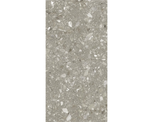 Detailaufnahme einer grauen Fliese mit Terrazzo Optik.