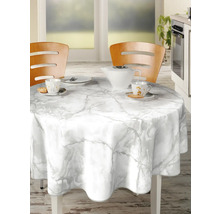 Runder Tisch mit Marmor-Optik-Tischdecke, gedeckt mit Geschirr