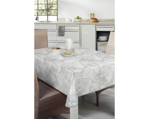 Tischdekoration mit Marmor Optik und Speisen in heller Küche