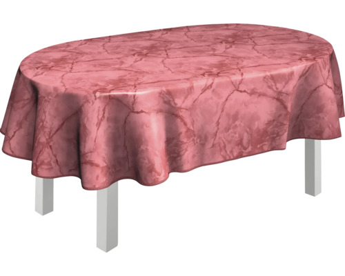 Ovaler Tisch mit gemusterter Tischdecke