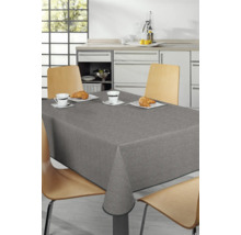 Esstisch mit grauer Tischdecke in einer Küche