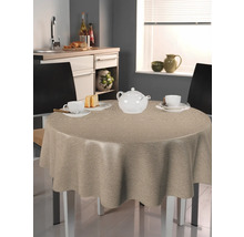 Runder Tisch mit beiger Tischdecke in einer Küche