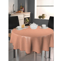 Tischszene mit runder Tischdecke, Teekanne und Geschirr