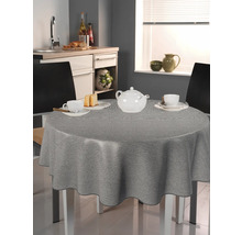 Graue Tischdecke auf einem runden Tisch in einer Küche