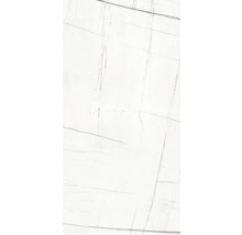 Nahaufnahme einer weißen Fliese mit grauen und braunen Marmorierungen